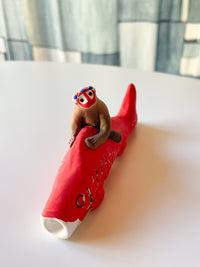 Clay doll - Monkey on the Koi fish!